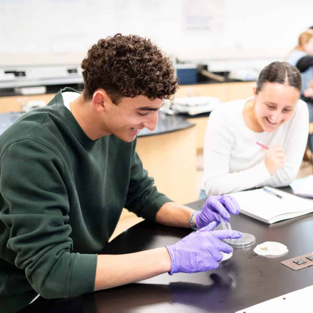 High School students working on a science project.