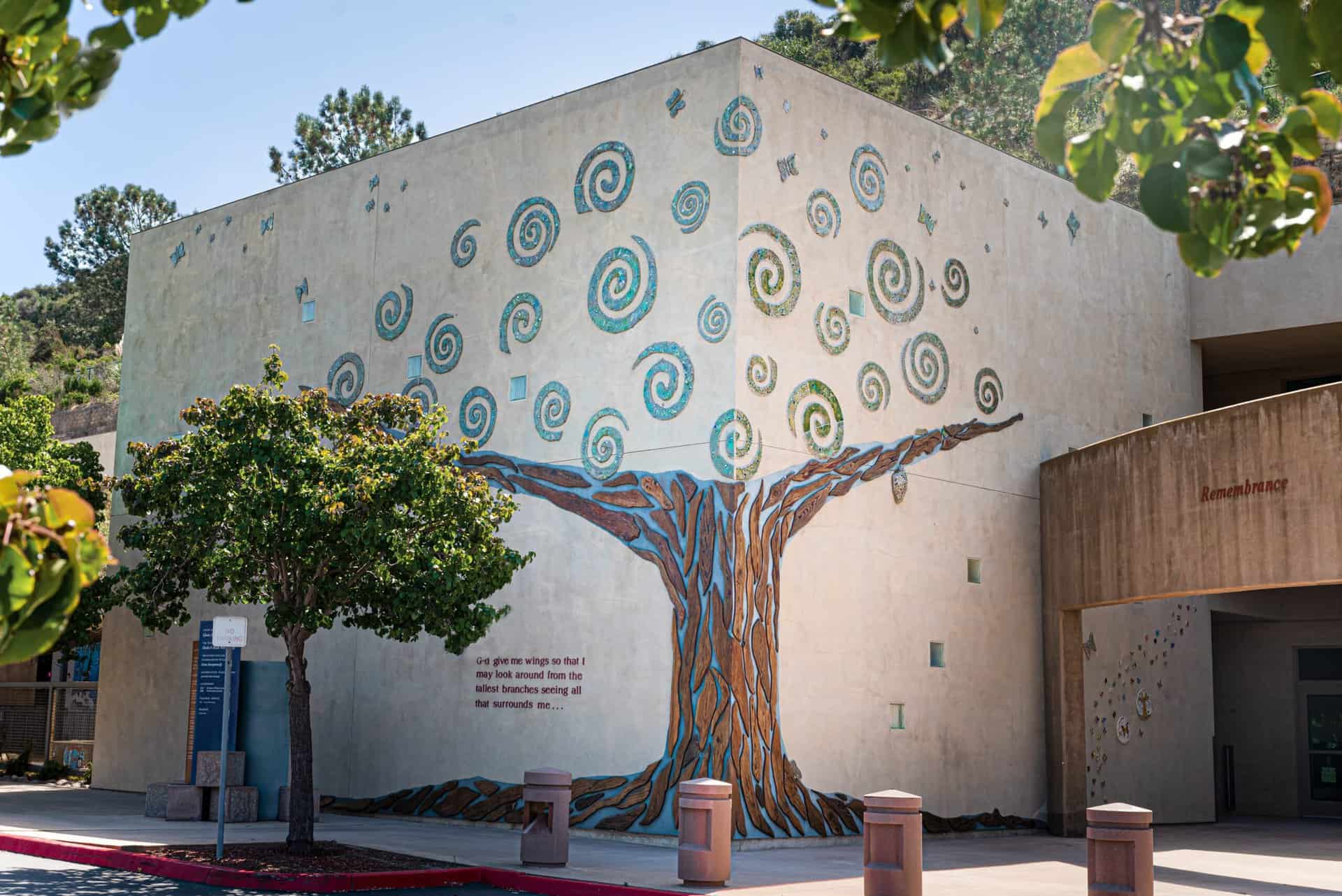 A building on campus that is decorated with the tree of life