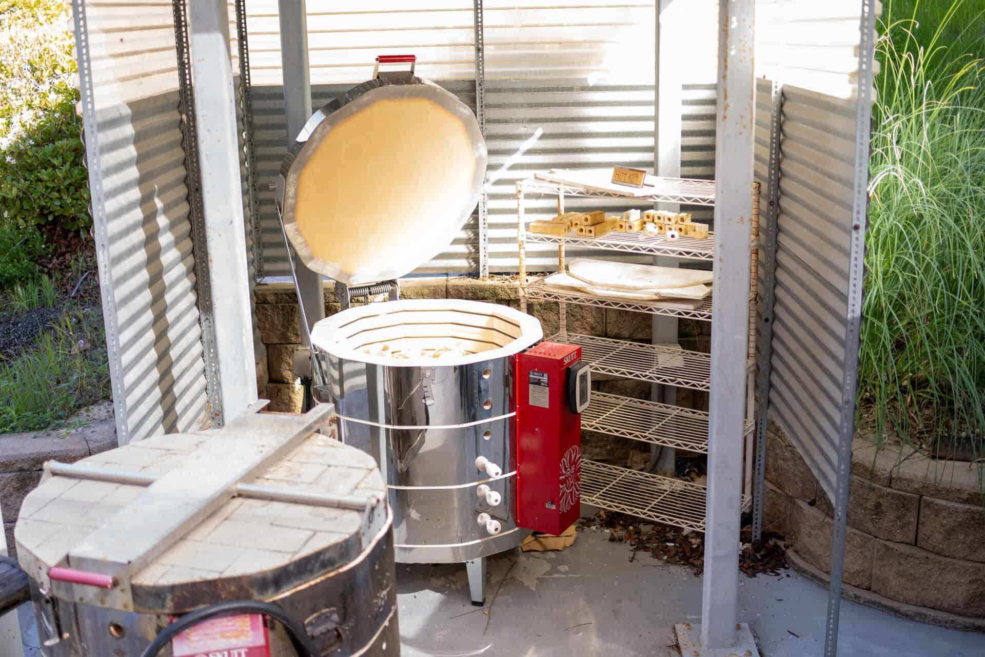 An open kiln in the ceramics and pottery area