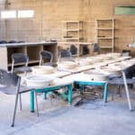 Chairs and bowls set up in the SDJA ceramics area.