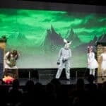 SDJA students dressed in costume during a school musical