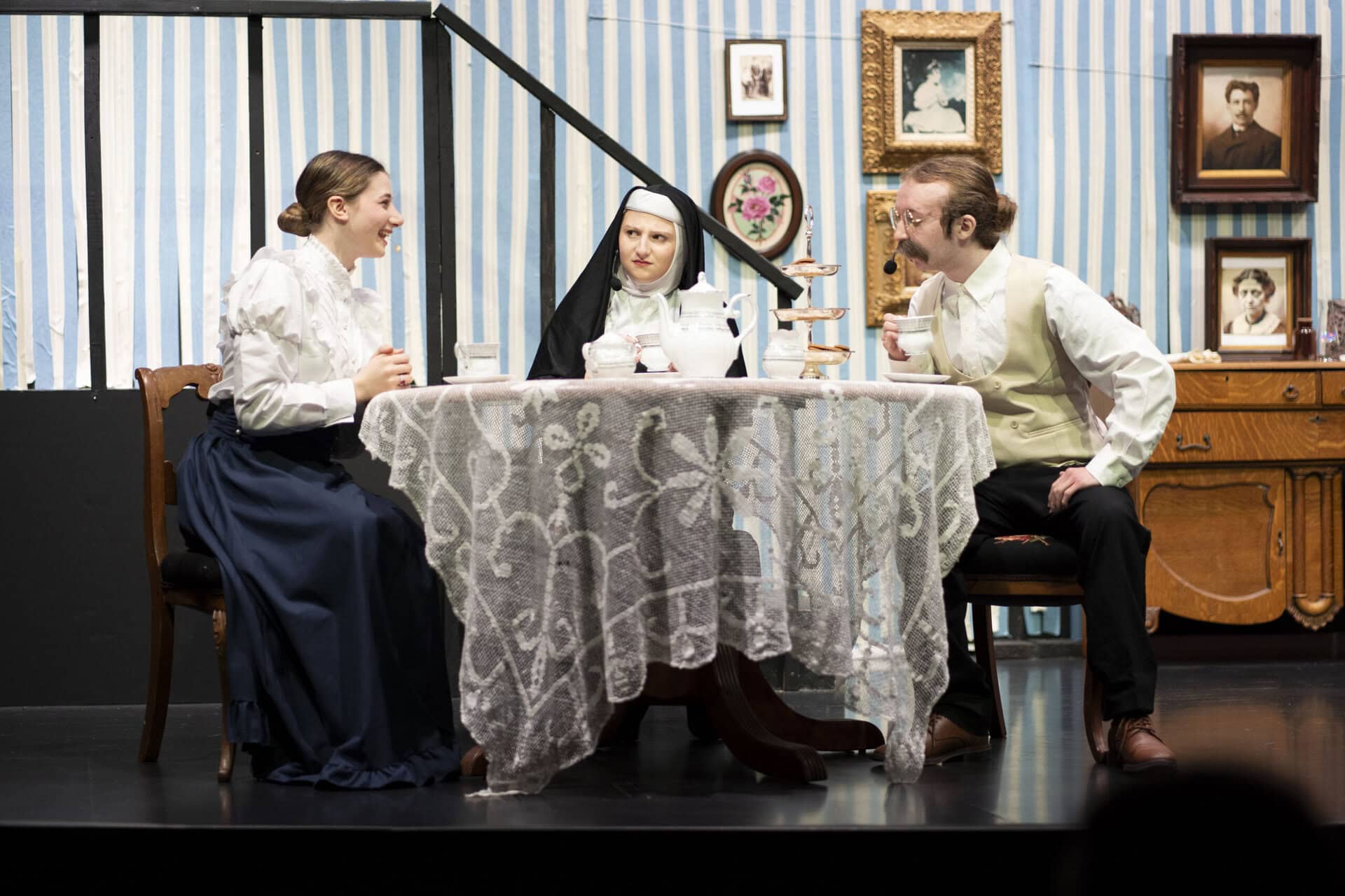 SDJA Upper School students in old fashioned clothing during a school play of "Arsenic & Old Lace"