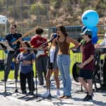 SDJA students and teachers performing music outdoors during Grandparents Day