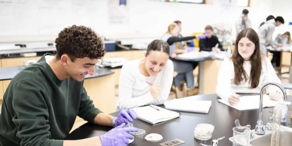 High School students working on a science project.