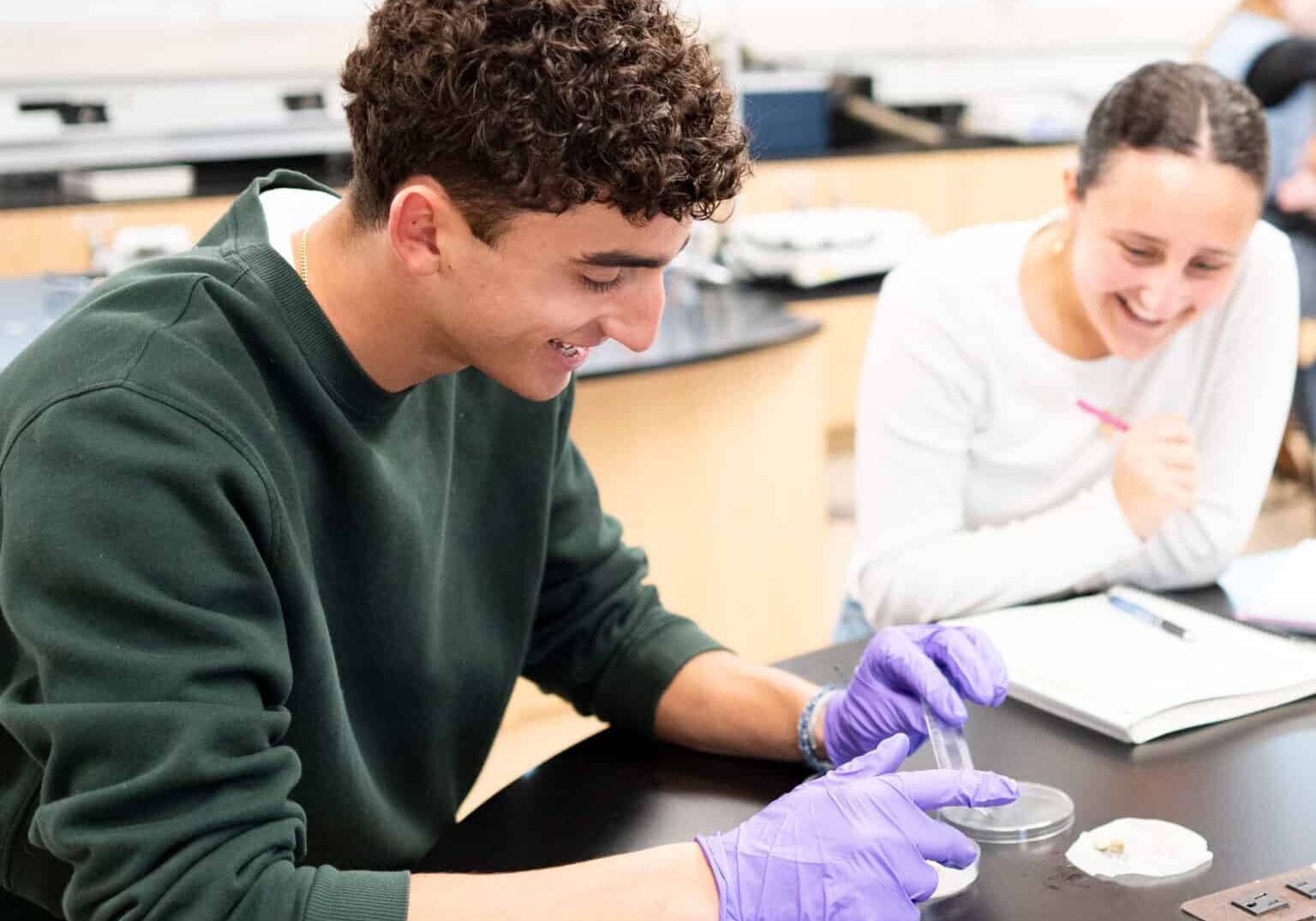High School students working on a science project.